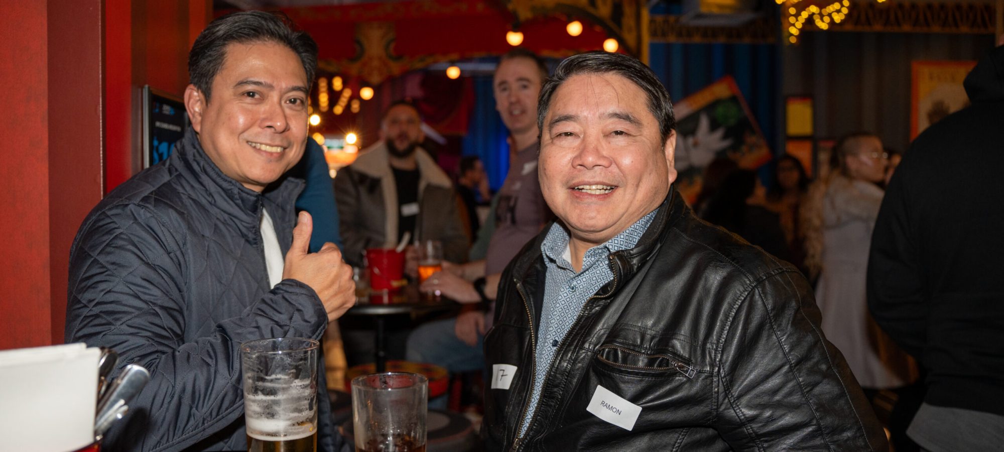 High-energy hero photo from a Melbourne event capturing guests engaging and celebrating